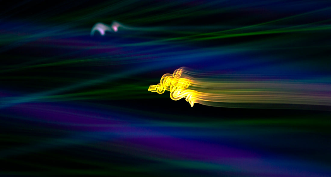 a blurry image of a bird flying in the sky