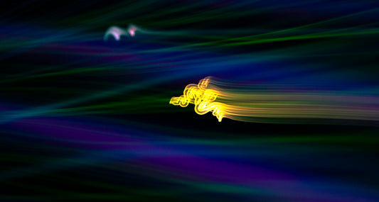 a blurry image of a bird flying in the sky